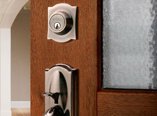 A close-up view of entry door handle and lock
