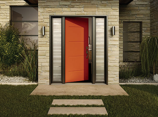 A modern, orange residential steel door with black sidelites