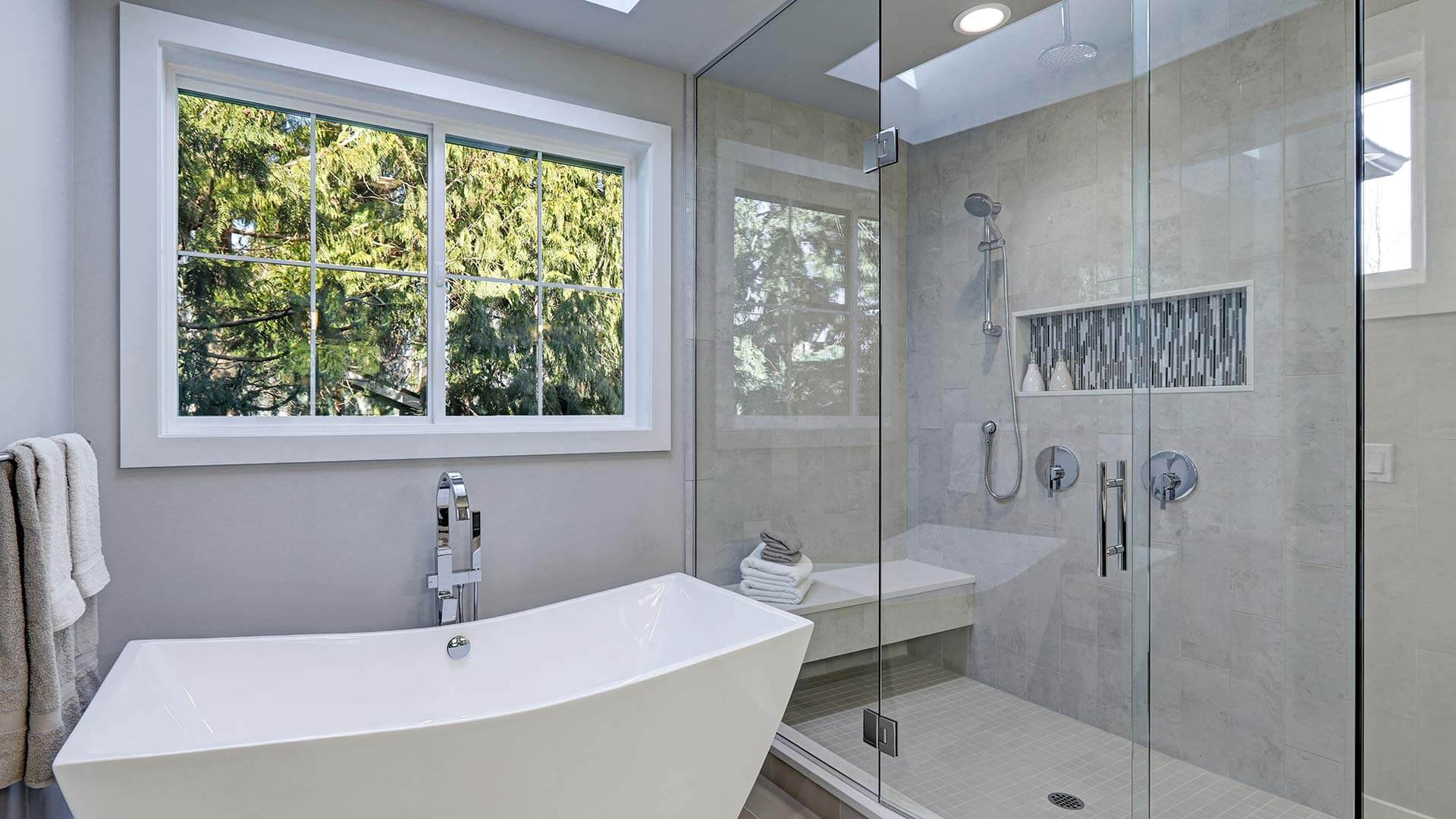 Modern renovated bathroom with a Classic Series Double Slider Window.