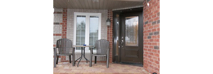 brown fibreglass door to front porch