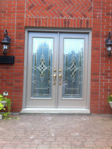 double steel entry doors in brick house