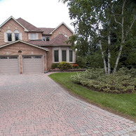 Brick home with bow windows