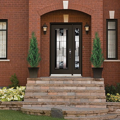 A full glass, chestnut brown entry door