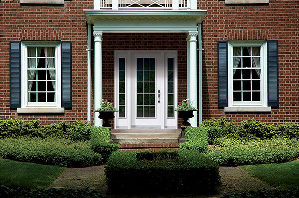 Colonial style front door with double sidelites