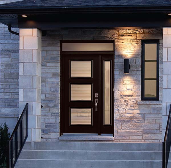 Exterior view of chestnut, modern front door with right sidelite and rectangular transom.