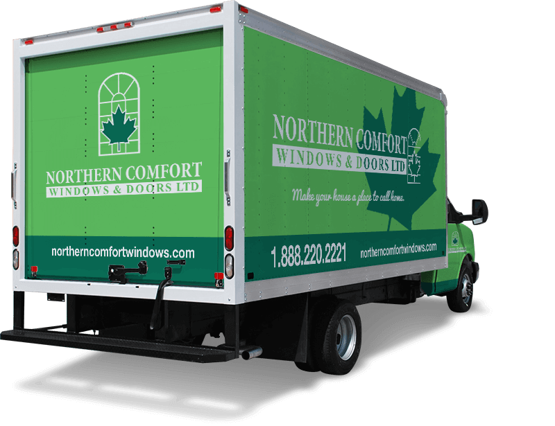 A green truck with Northern Comfort Windows and Doors Branding on it.