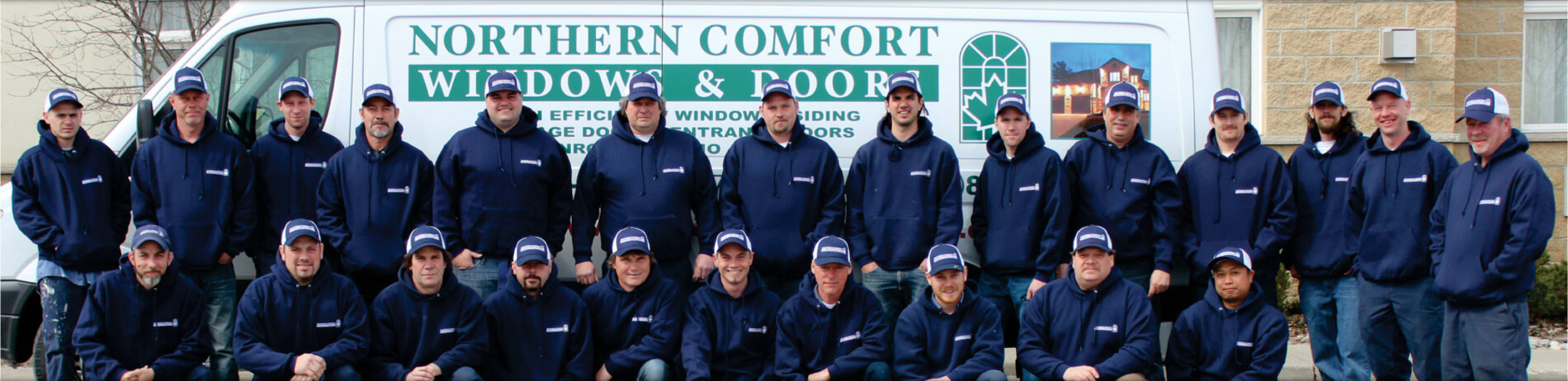 A group of window, door, and garage door installers.