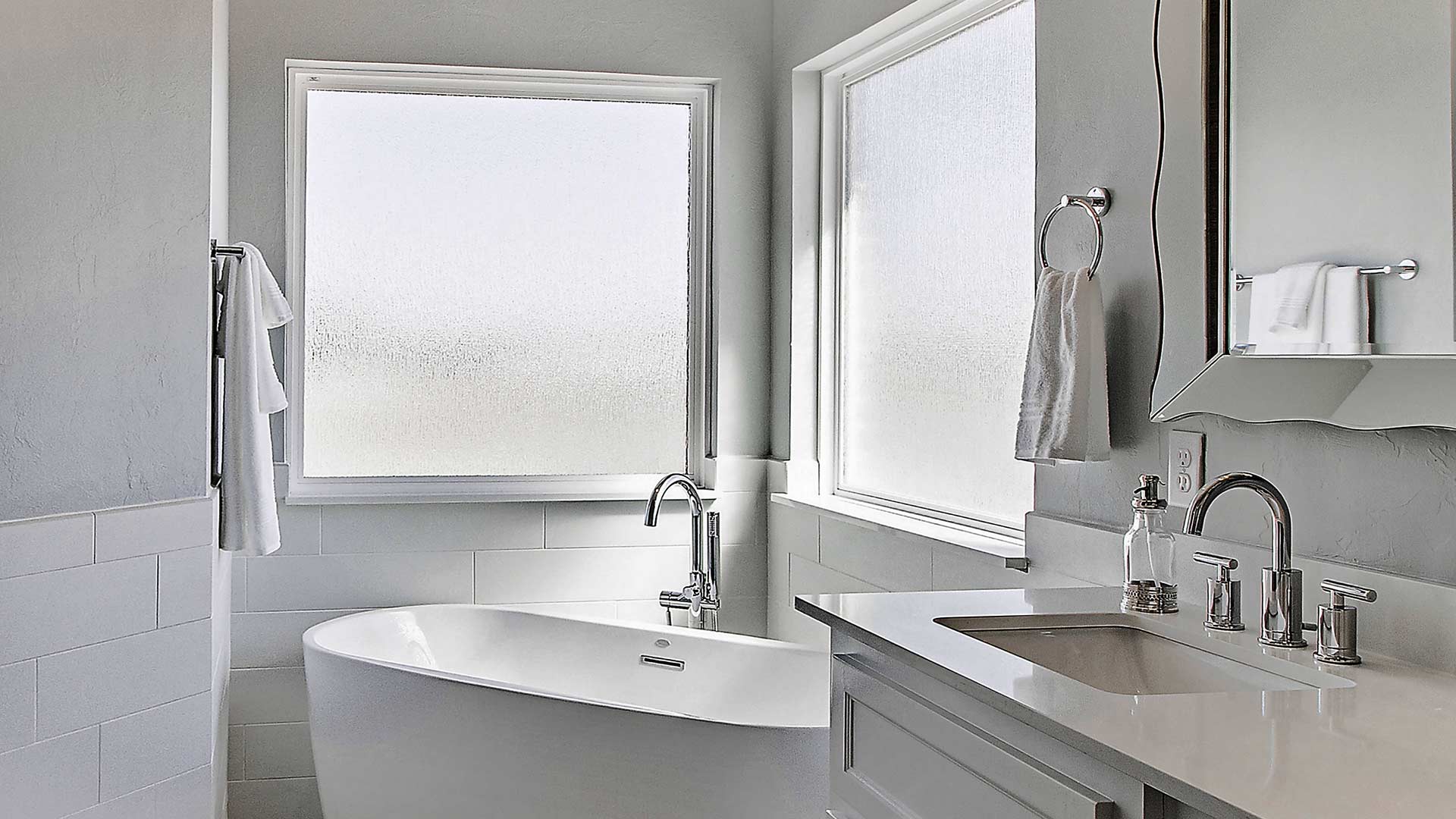 A bathroom window with specialty frosted privacy glazing.