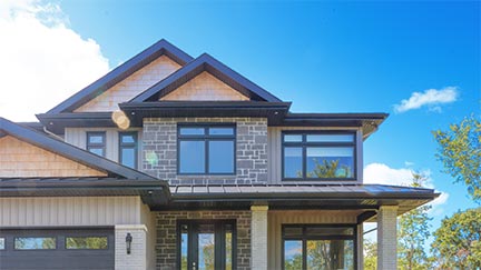 A photo of a house in Barrie with Northern Comfort Windows.