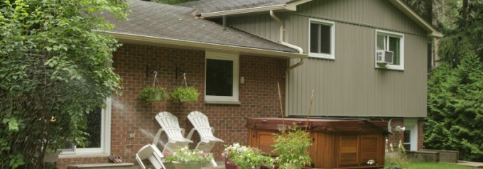 tan siding with brick