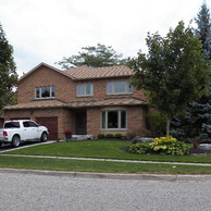 brick home with front bay window