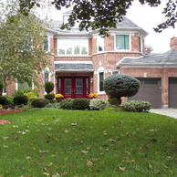 brick home with red door