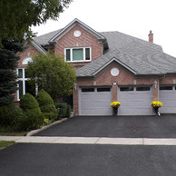 three garage door home