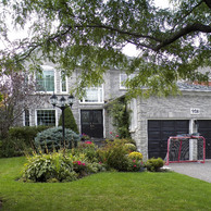 luxury home with beautiful front yard