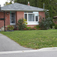 small red brick home