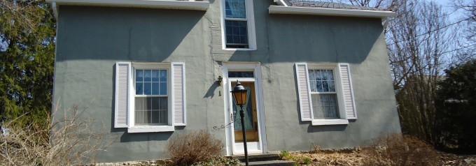 small home with single hung tilt windows