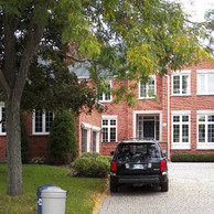 luxury brick house with traditional windows