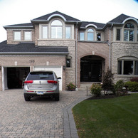 luxury home with multiple shaped windows