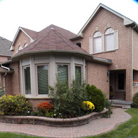 beautiful bow windows on front of home